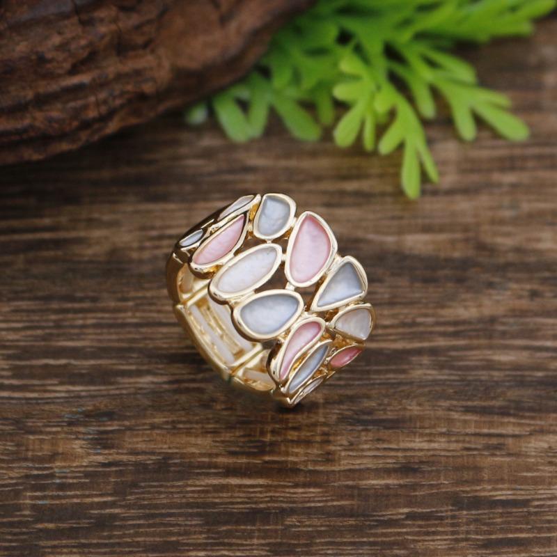 New enamel color hollow geometric petal elastic ring women's simple high-end versatile flower ring
