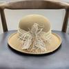High-end straw hat women's summer seaside vacation sunscreen sunshade beach hat big edge crimped bucket hat bowler hat