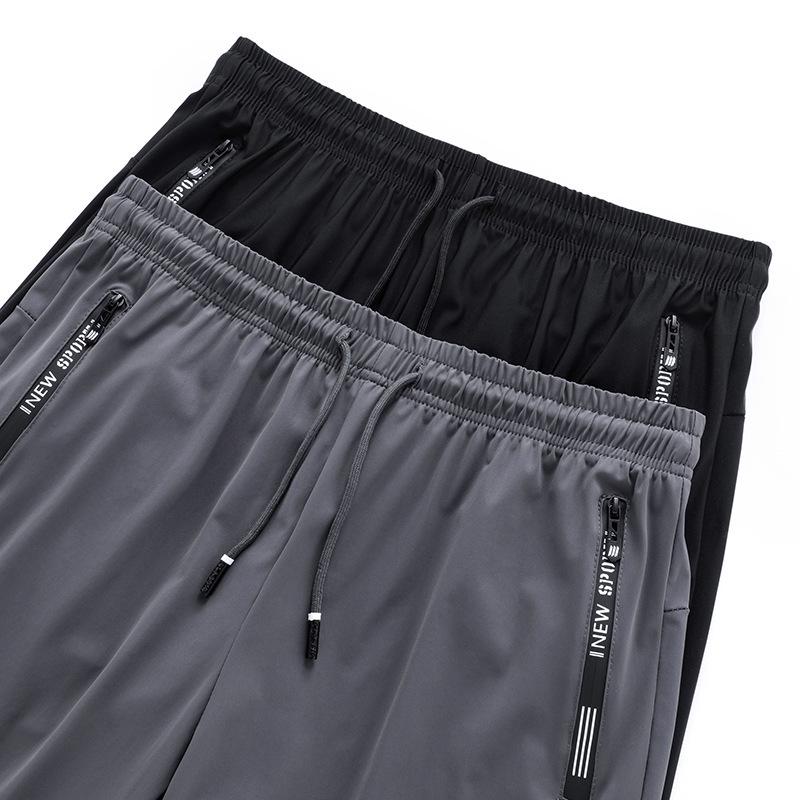 Men's Summer Ice Silk Quick-Dry Elastic Shorts - Lightweight, Breathable Sportswear for Youth.