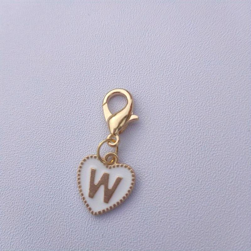 Hetsäljande 26 engelska bokstäver vit dubbelsidig persikohjärta nyckelring hjärtformad legeringsaccessoarprydnad