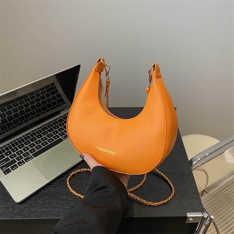 

Korean version of armpit small bag 2024 new summer casual simple shoulder bag texture foreign style casual bag hand carry women s bag помаранчевий