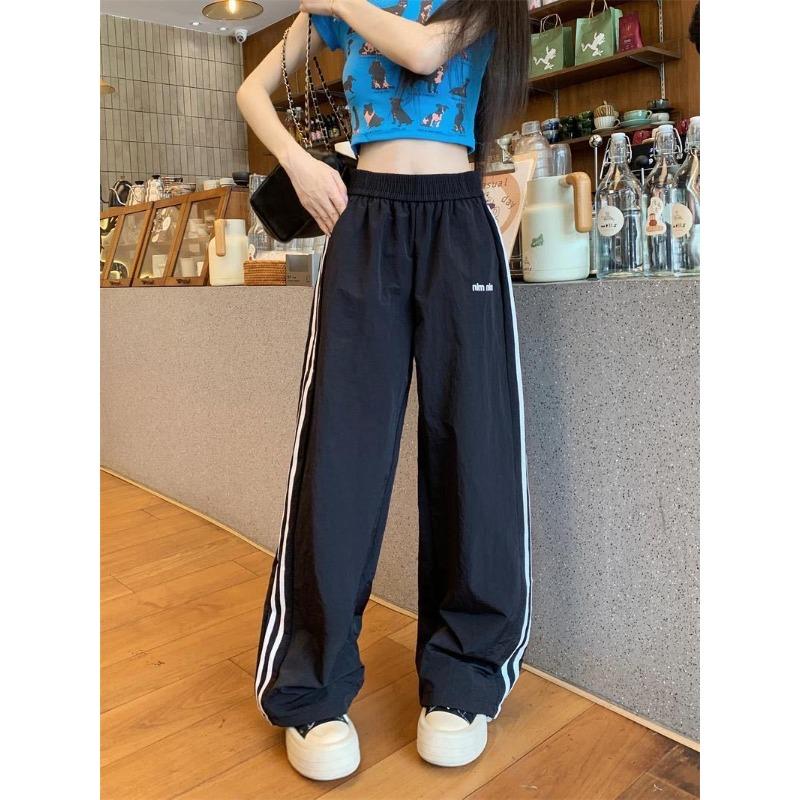 

Контрастного цвета быстросохнущие спортивные штаны дофаминовые повседневные полосатые свободные повседневные брюки уличный стиль ретро дышащие напольные брюки S size 80-47.5 kg чёрный