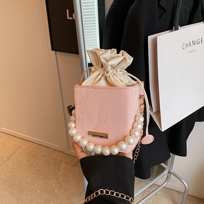 2025 spring and summer new drawstring fashion Korean version of gentle texture pearl chain handbag versatile ins messenger bag women