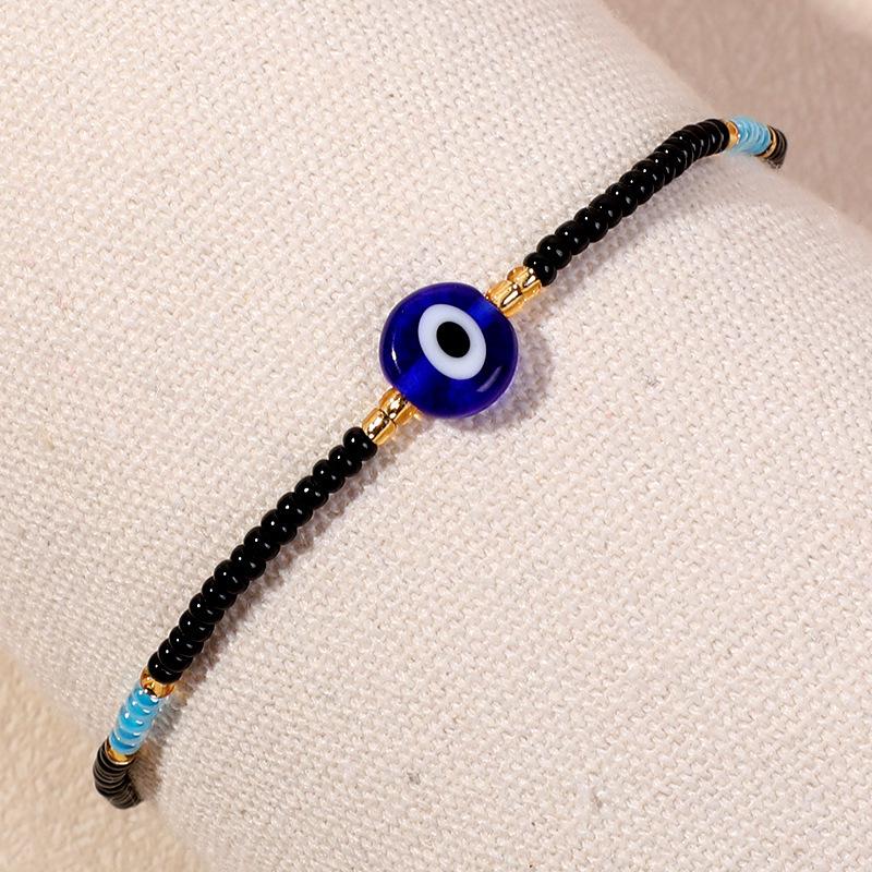 Bracelet en perles d'œil du diable tissé à la main avec motif de niche en verre