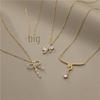 18K Gold Copper Necklace with Diamonds & Zirconia Bow Design
