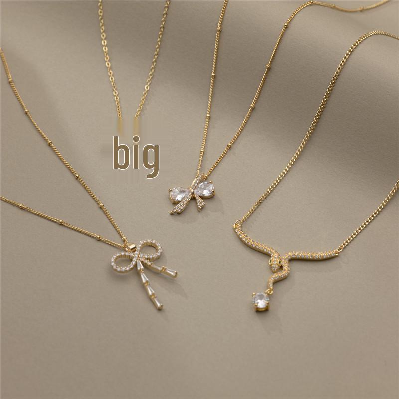18K Gold Copper Necklace with Diamonds & Zirconia Bow Design