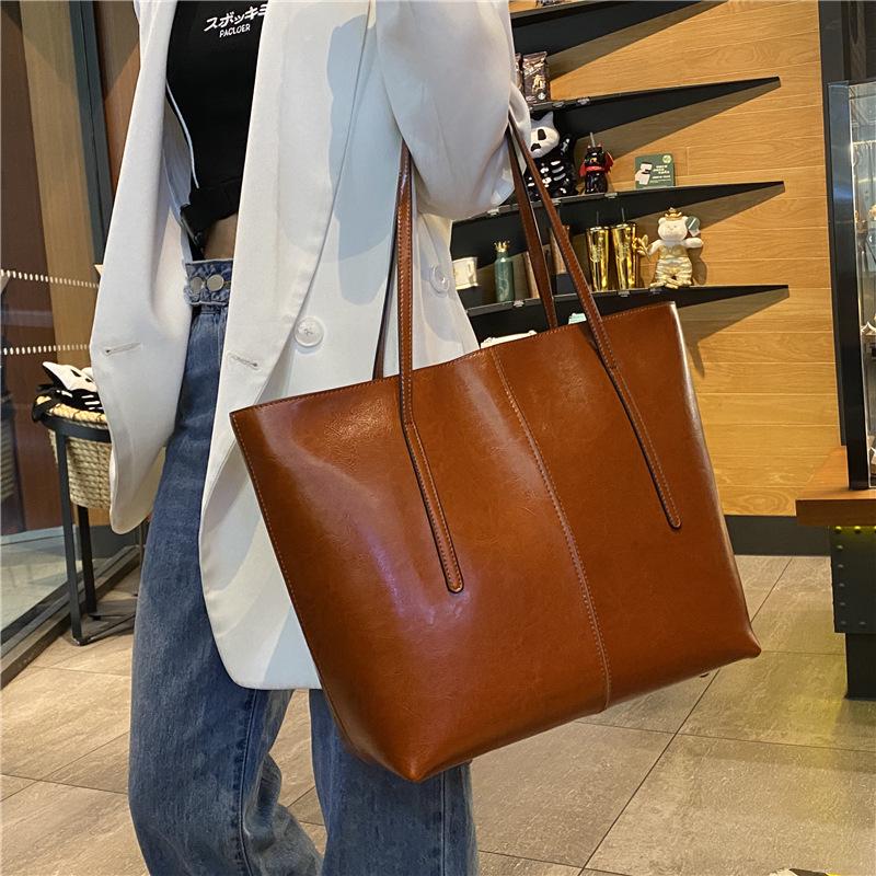 

Жіноча ділова сумка-тоут великої місткості з натуральної шкіри - Легка сумка для носіння в руці та на плечі 35*14*30 cm