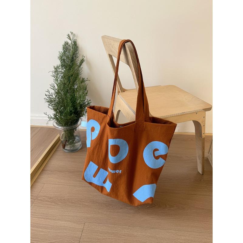 

New spring college sports style satchel contrasting color letter tote bag large capacity shoulder casual fashion women s bag tide
