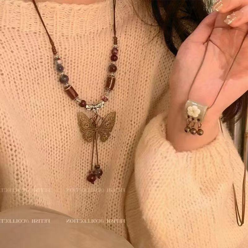 Zen Feather Pendant Long Necklace Women's Retro Ethnic Versatile Sweater Chain New Chinese Accessories