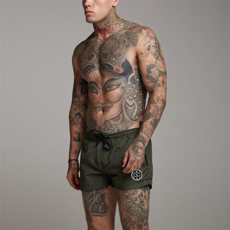 Muscleguys Workout Street Wear Mens Loose Running Shorts Running Hiking Short Jogger Pants