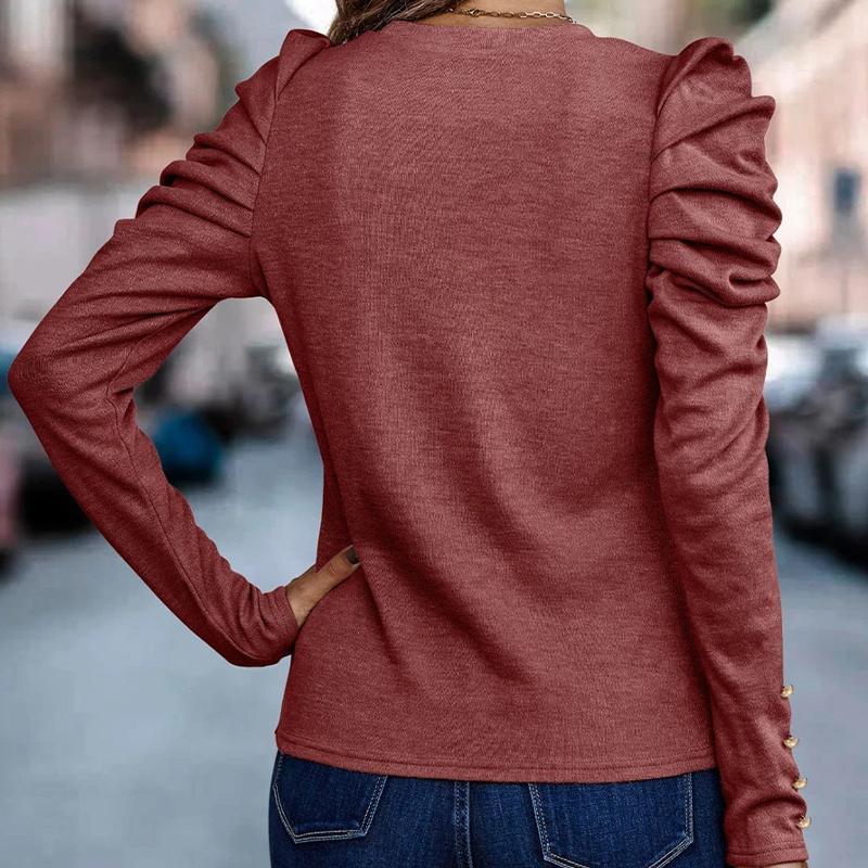 Top da donna a maniche lunghe con maniche a sbuffo e collo rotondo
