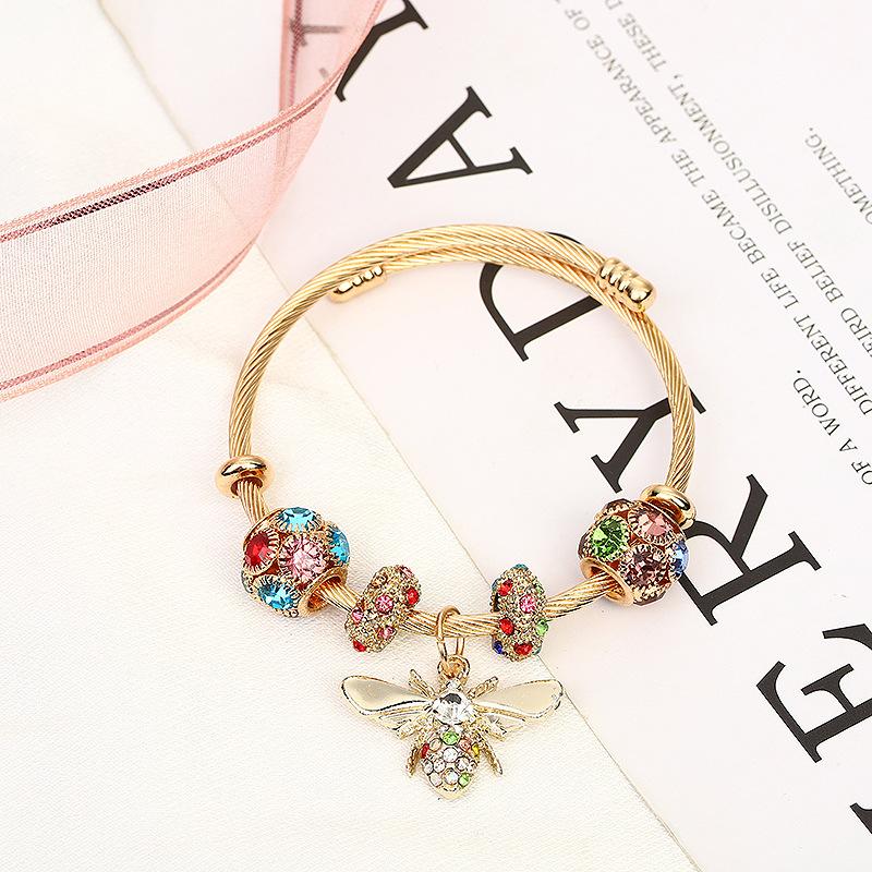 Bracelet réglable en argent et or avec diamants brillants et abeille