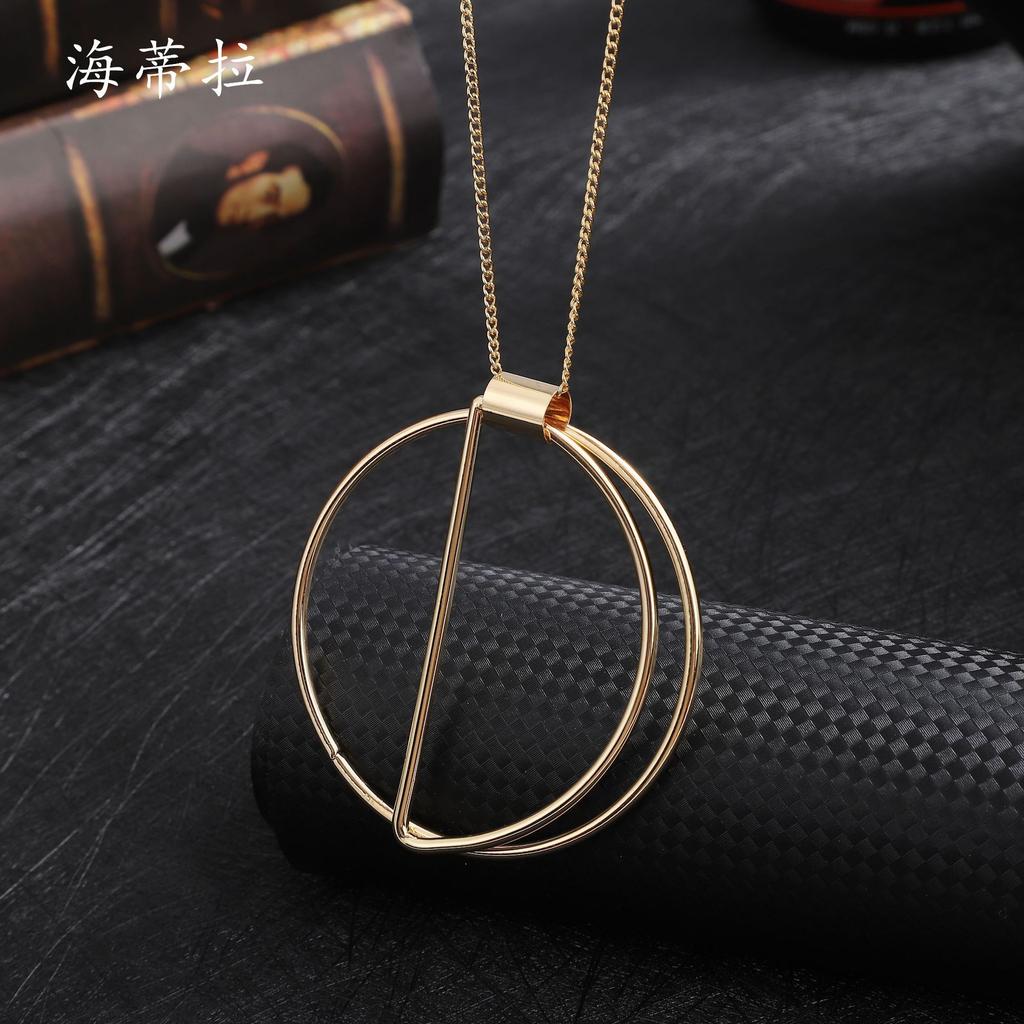 New Gold Hollow Ring Pendant, Fashionable and Simple Women's High-end Long Banquet Sweater Chain