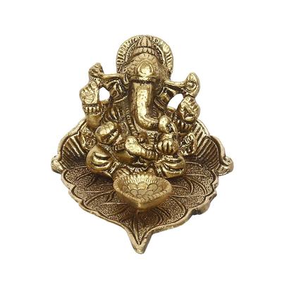 Golden Metal Handcrafted Lord Ganesha Idol with Diya On Leaf - Diya for Diwali, Ganesh Chaturthi - Diwali Diya for Puja Room