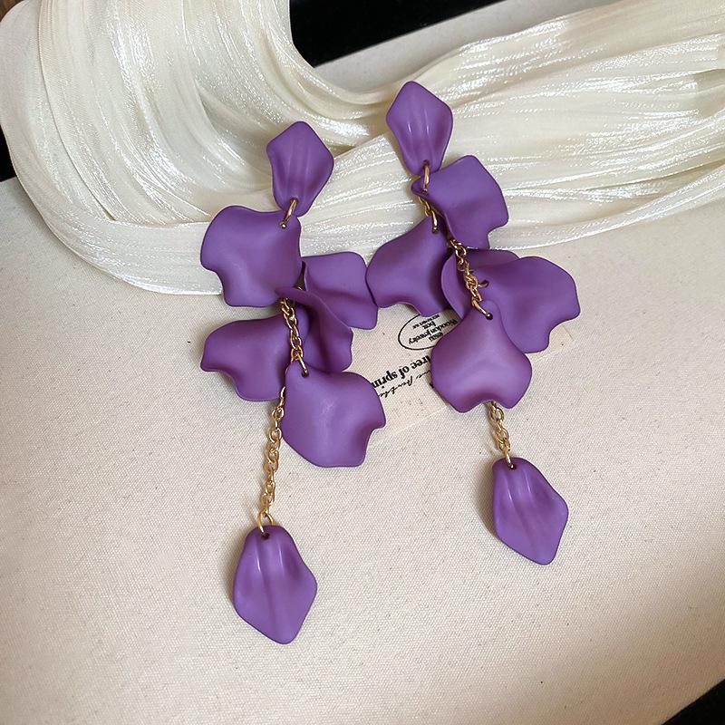 Boucles d'oreilles bohèmes roses à fleurs de perles de rocaille et pompons de perles