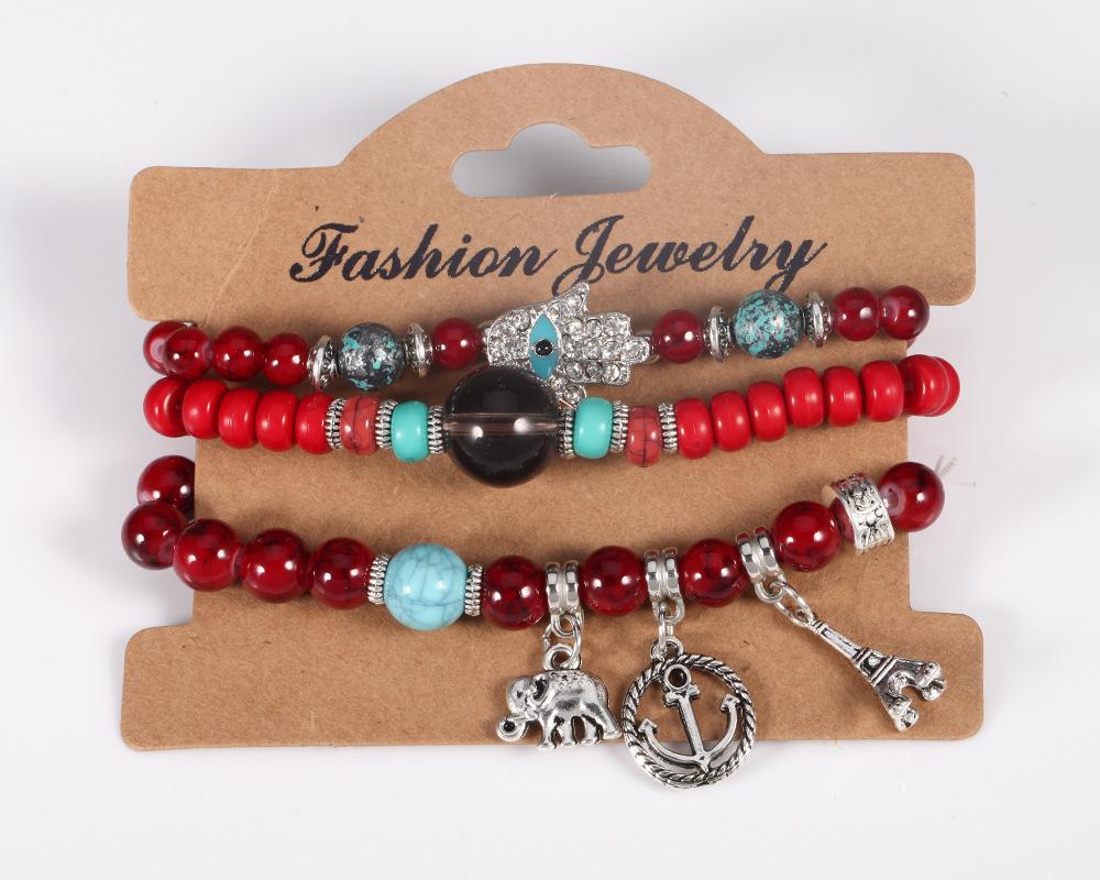 

JYL TS Bracelet Bohemian Eiffel Tower Wings Charm Ignites Adventure Red нектар