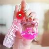 Strawberry Bear Doll Keychain with Colorful Oil-Filled Bottle and Milk Tea Cup Pendant