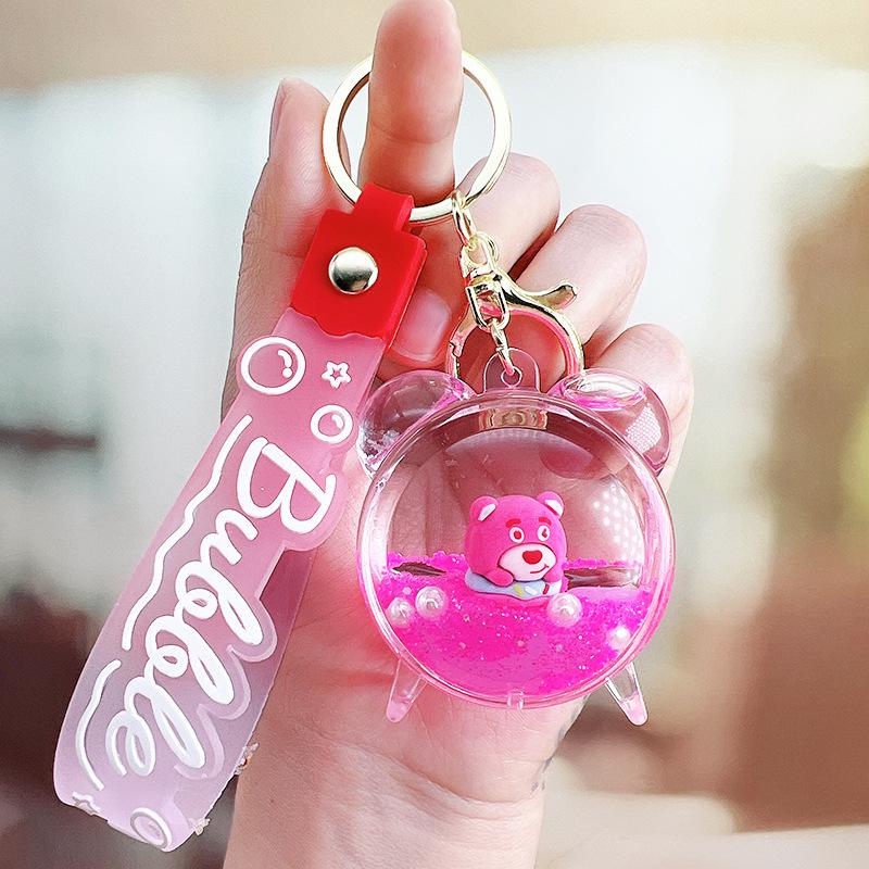 Strawberry Bear Doll Keychain with Colorful Oil-Filled Bottle and Milk Tea Cup Pendant