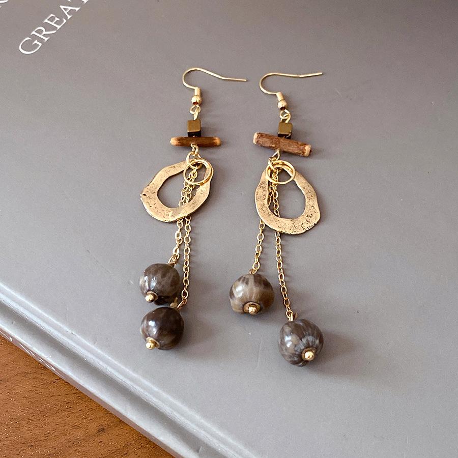 Irregular wood round hollow ear hook ethnic style retro personalized commuter earrings niche high-end earrings women