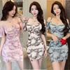 Spring and Summer New Sexy Celebrity Suspender V-neck Printed Dress Temperament High Waist and Thin Hip-wrapped Mesh Skirt Women