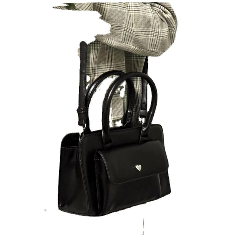 Spring niche casual fashion versatile high-end textured bag women's hand shoulder oblique span small square bag