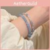 Sommerliches, modisches silbernes Perlenarmband mit blauem Topas und geometrischen Elementen für Damen