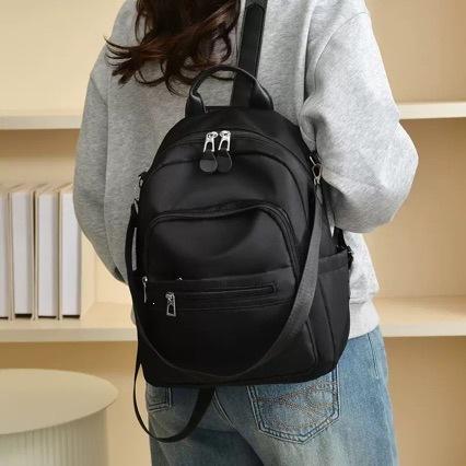 Schoolbag backpack 1011 new Korean version large capacity multi-pocket schoolbag lightweight and simple nylon anti-splashing travel backpack