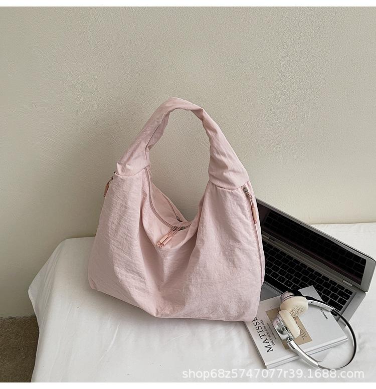 

2025 New Large Capacity Versatile Portable Canvas Bag Premium Sense Tote Bag Fashion Commuter Underarm Shoulder Bag Women розовый