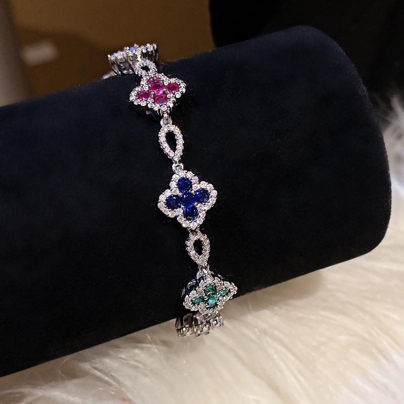 Pink Diamond Zirconia Starburst Flower Bracelet: Trendy, Luxurious Jewelry with Unique Design.