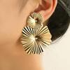 Gold-Tone Geometric Twist Earrings: Fashionable and Versatile Multi-Layer Braided Earrings for Women.