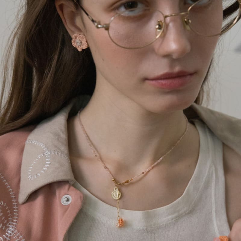 

MERRYMOTIVE Orange sunshine gemstone surgical necklace Free