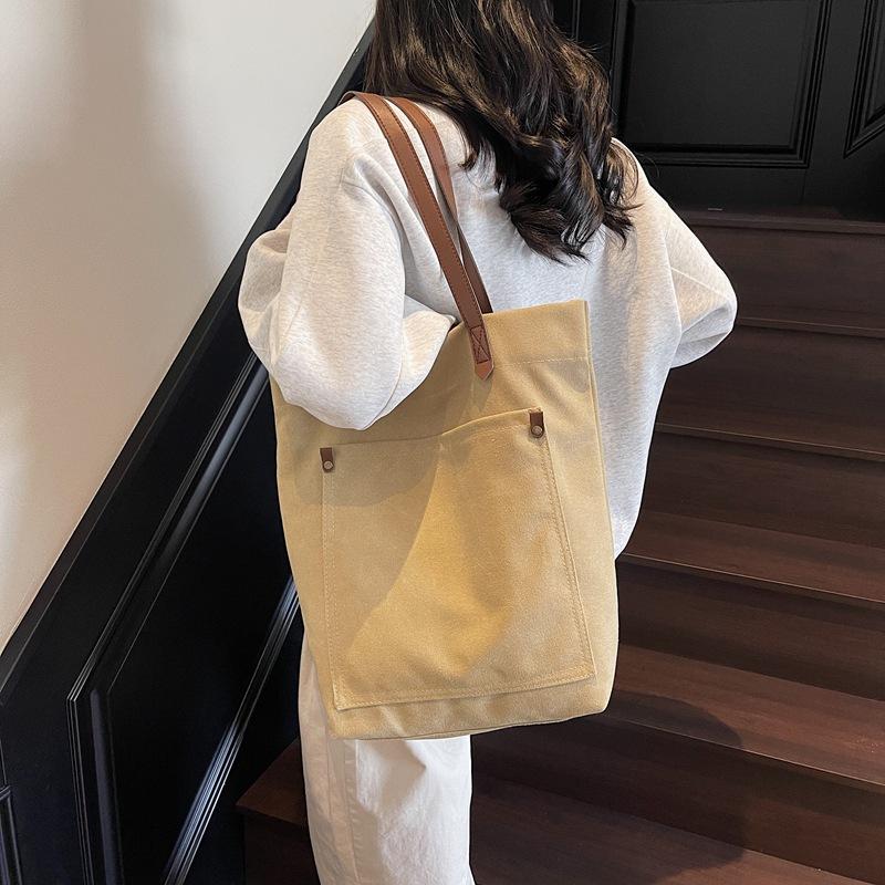 Niche retro canvas bag women's new large-capacity casual shoulder bag class commuter tote bag