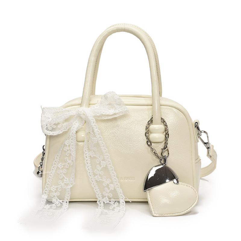 Korean version of the hot sale niche simple solid color hand pillow bag versatile fashion high texture commuter messenger bag women