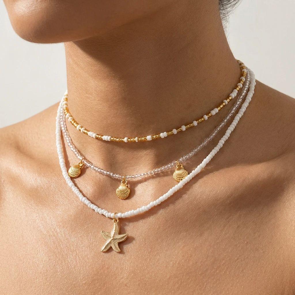 Handgefertigter mehrschichtiger gestapelter Choker aus Reiskörnern für Damen Einfacher Seestern-Muschel-Anhänger Halskette Bohemian Strand Schmuck Geschenke
