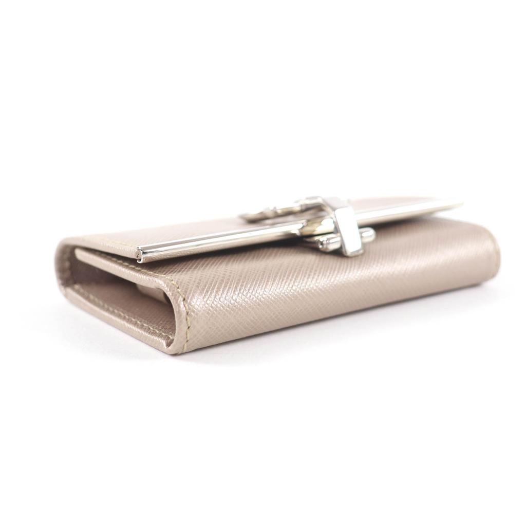 Excellent Porte-clés Salvatore Ferragamo Cuir Doré Champagne Femme 224627 Occasion