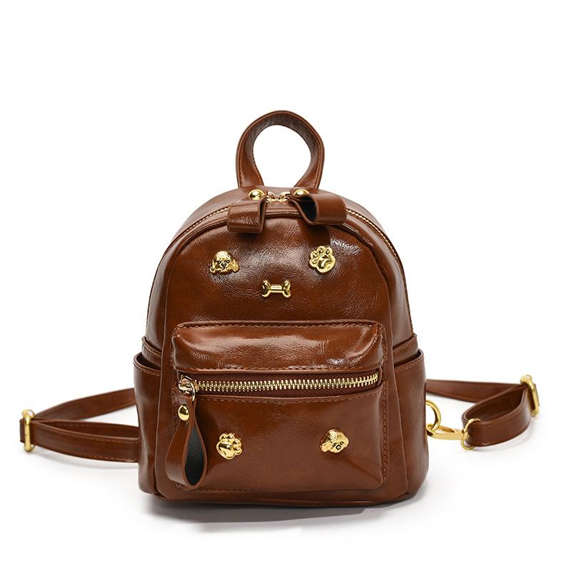 

Корейская версия, горячо продаваемая, милая сумка-щенок с заклепками, модная, портативная, маленькая, универсальная, для отдыха и путешествий, высококлассная женская сумка на плечо коричневый