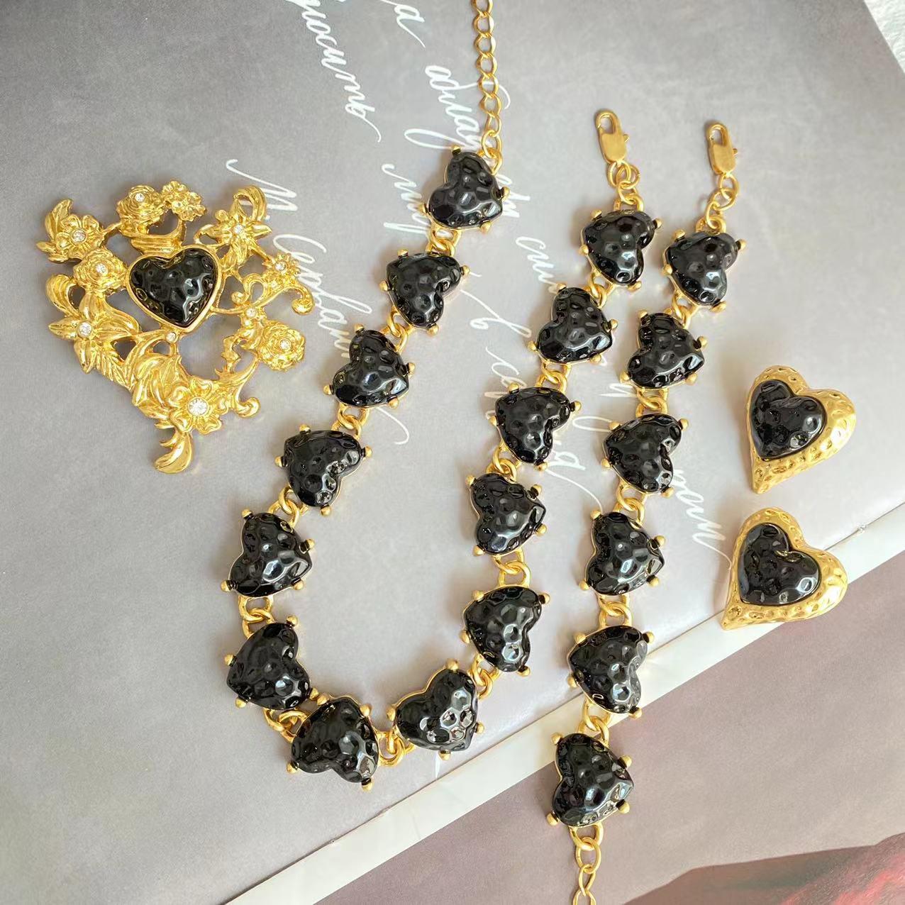 

Retro Heart Glass Jewelry Set: Gold-Plated Earrings, Bracelet, Brooch, and Ring