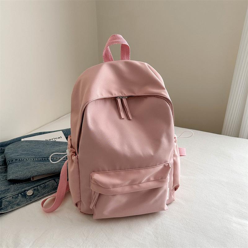 New solid color large-capacity simple casual Oxford cloth student class schoolbag men's and women's casual backpack