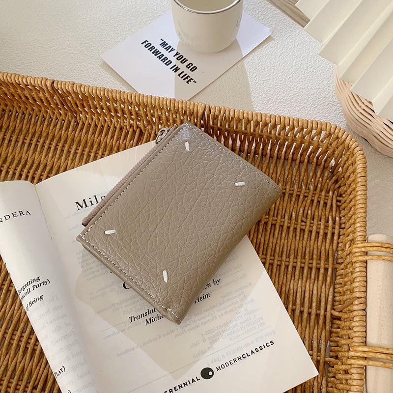 Korean version of women's wallet ins women's small wallet women's high-end short wallet change bag solid color zipper hand-held