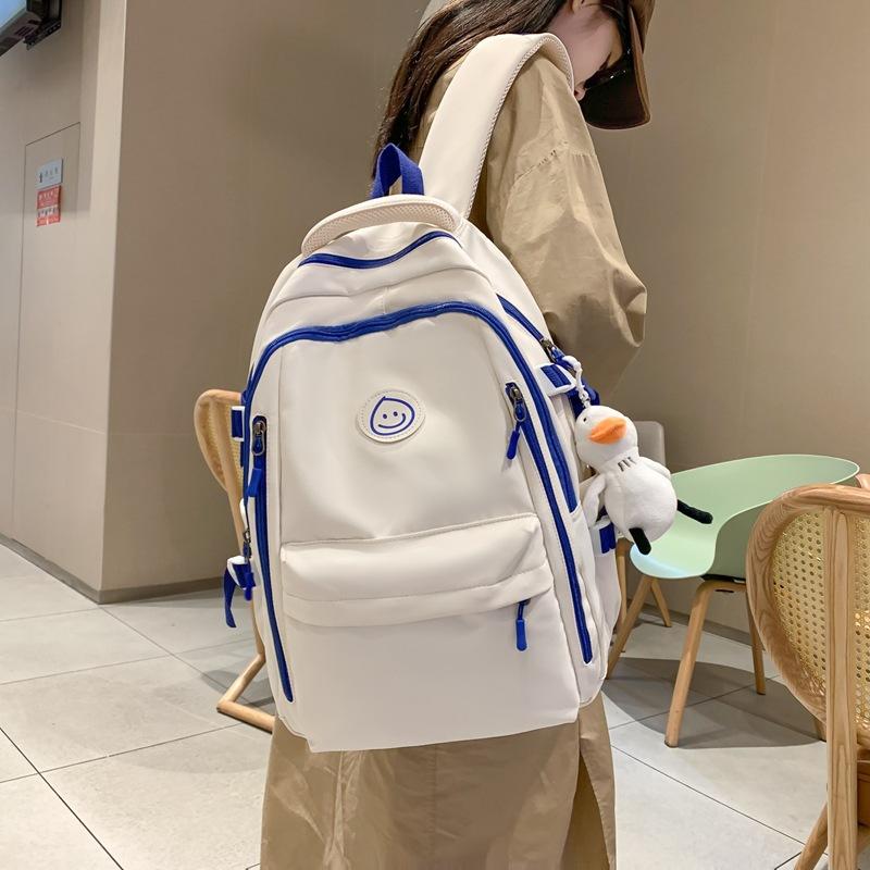 New schoolbag female ins Mori campus large-capacity couple backpack high school student Korean version of simple backpack tide