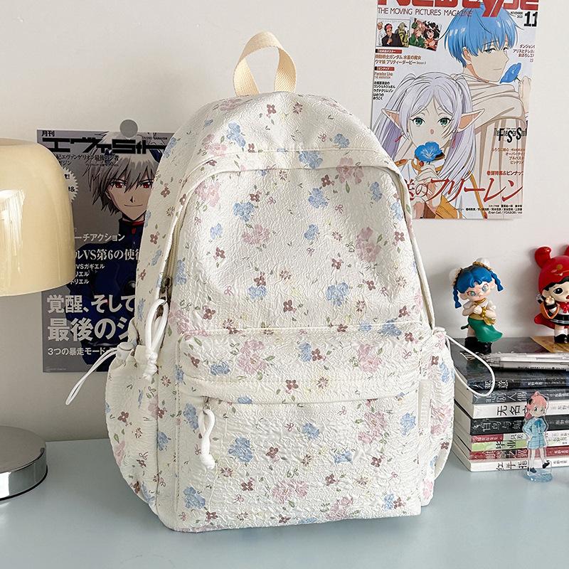 Korean ins cute little floral high-value schoolbag junior high school girls large-capacity backpack high school students casual shoulders