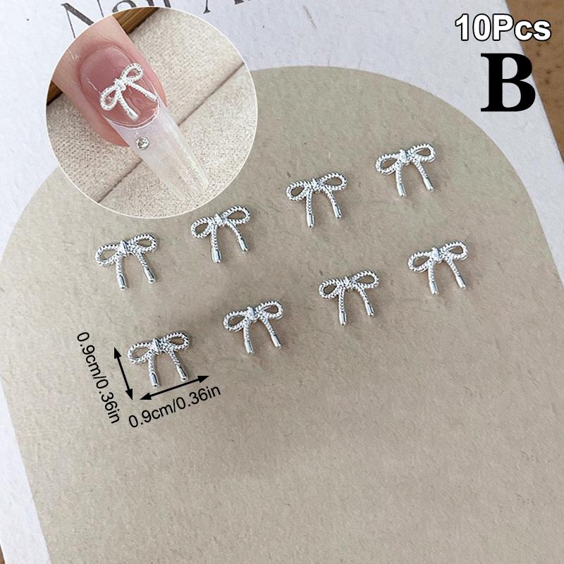 

10 шт. сплава бант любовь ногтей украшения 3D роскошные металлические серебряные банты в форме ювелирных изделий DIY маникюр дизайн принадлежности B