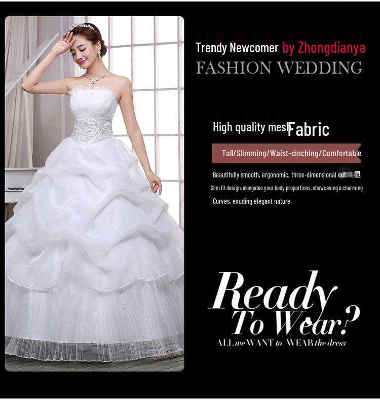 2025 Bílé šněrovací šaty bez ramínek v korejském stylu, délka až na zem, organzové svatební šaty