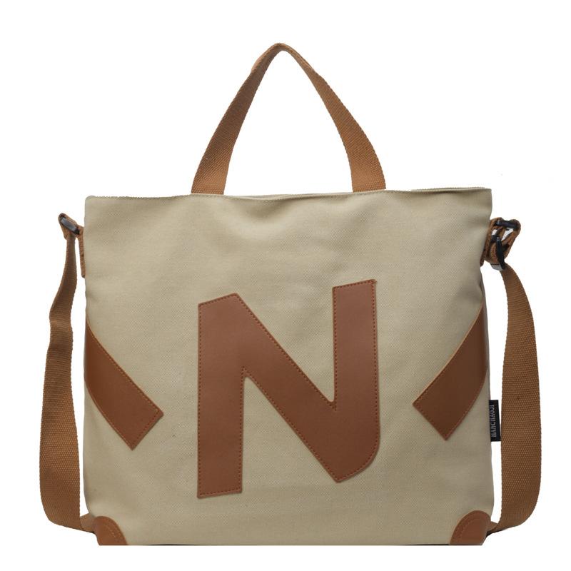 

Big letter mommy bag 2025 new contrasting color texture portable shopping bag shoulder bag Korean version casual make-up bag хаки