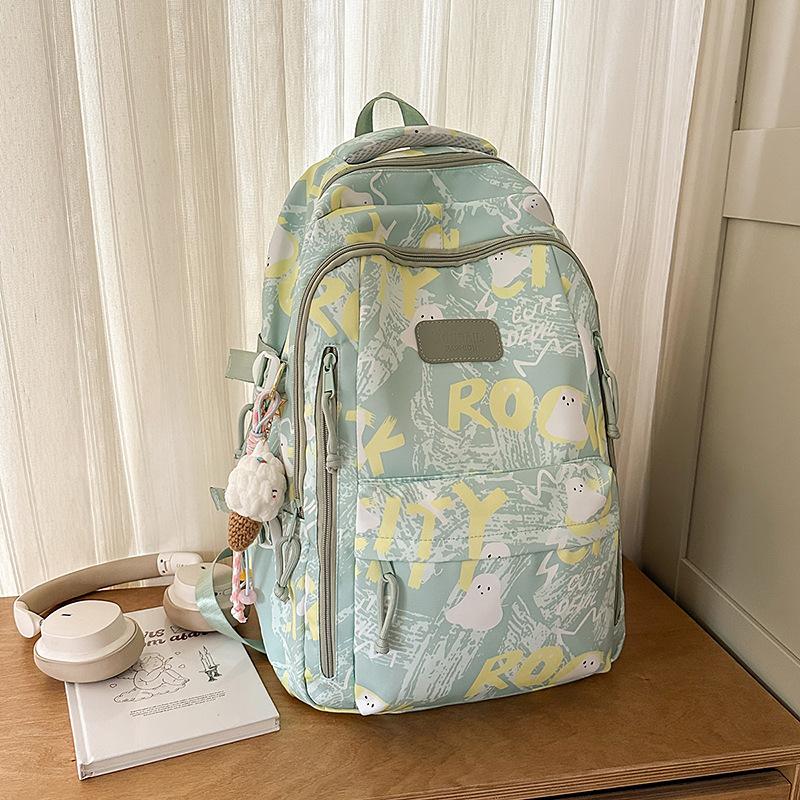 Backpack female junior high school college students high value new large capacity graffiti design sense backpack female