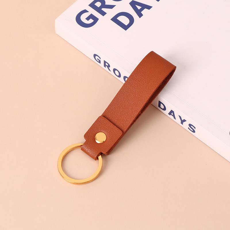 Creative Minimalist PU Leather Keychain: Solid Color Car Anti-Lost Pendant and Bag Accessory