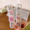 A Transparent Plastic Jewelry Box with 28/56 Compartments for Storing Earrings, Beads, and Crafts.