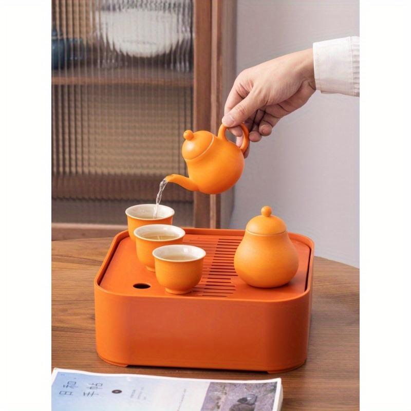 1 sada 6 kusů keramické cestovní čajové soupravy Lucky Orange Konvice a šálky Přenosná čajová souprava s podnosem a přenosným pouzdrem Ideální pro venkovní kempování a domácí použití Slavnostní