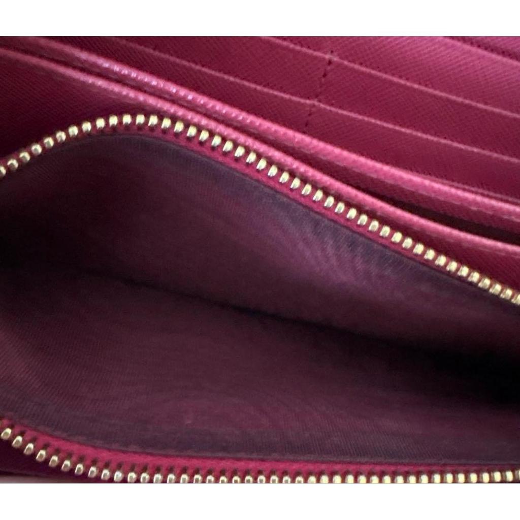 Used PRADA long wallet ribbon round zipper