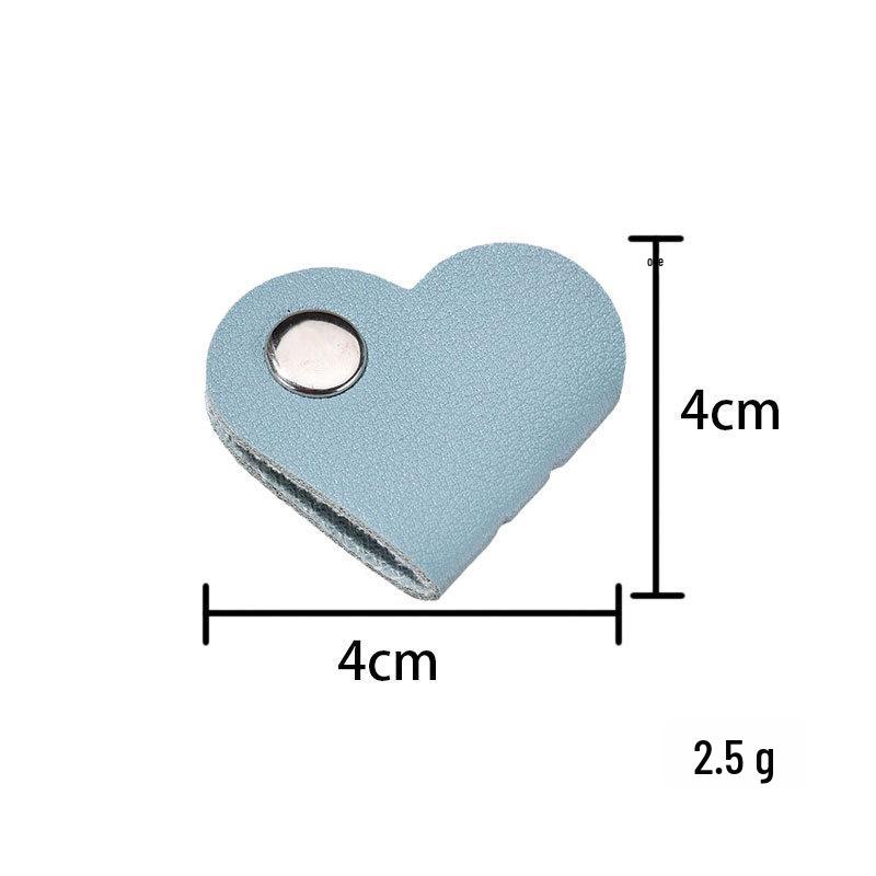 Kožený organizér na kabely a sluchátka ve tvaru srdce